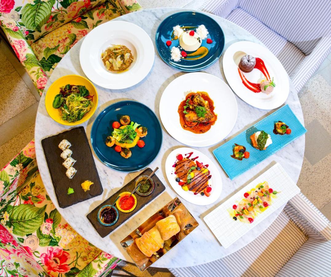 The Merchant House Manama Exterior photo A selection of dishes at the restaurant
