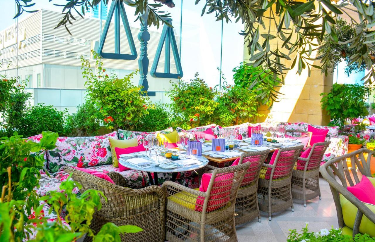 The Merchant House Manama Exterior photo The patio at the Sugar Factory American Brasserie